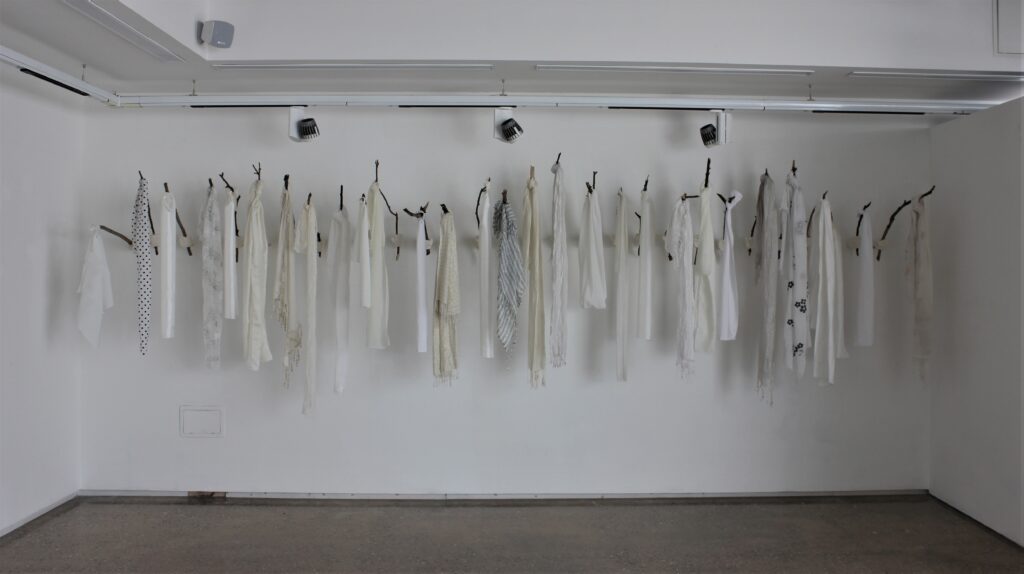White Wednesdays (2018) [Plaster, sticks, headscarves]