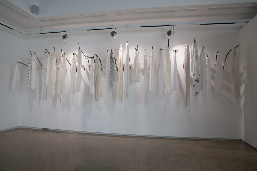 White Wednesdays (2018) [Plaster, sticks, headscarves]
